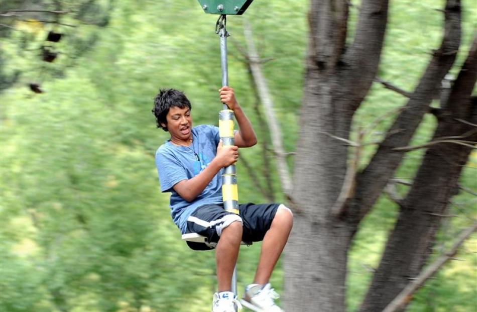 Wairongoa Bennett (14), of Otaio, enjoys a ride on the flying fox at the holiday park. Photo by...