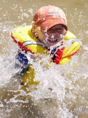 Will Nichol (4), of Lee Stream, splashes in The Blue Lake, St Bathans. Photo by Tracy Crossan.