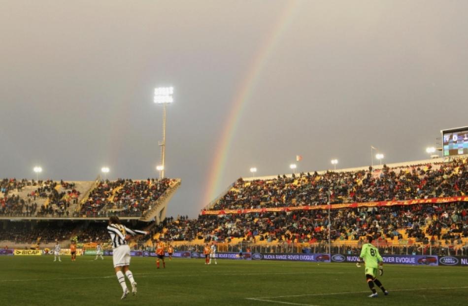 A rainbow is seen as Juventus and Lecce play during their Italian Serie A football match at the...