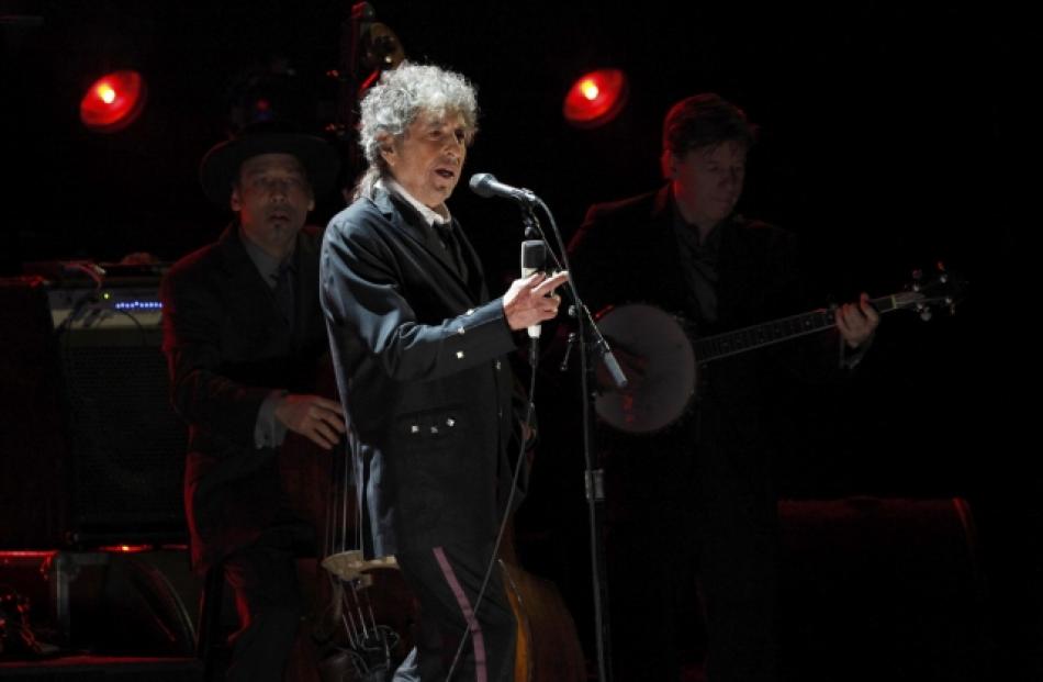 Bob Dylan performs during a segment honouring Director Martin Scorsese, recipient of the Music +...