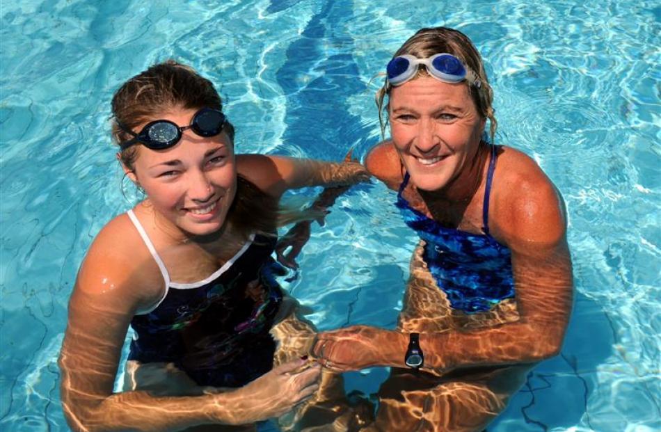 Surf lifesavers Holly Smaill (16) and her mother, Sue Creighton, during a training session. Photo...