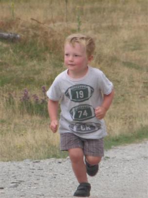 Three-year-old Dardy Harrington, of Christchurch, could not help but have a run up the finishing...