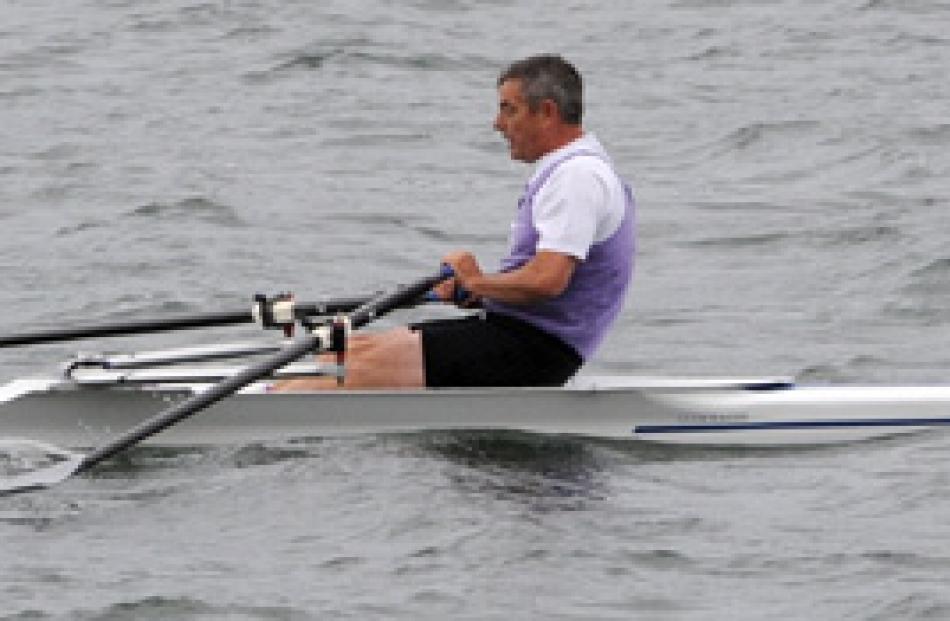 Peter Midgley wins the men's singles E class rowing.