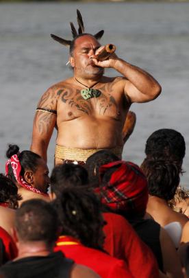 The waka arrive at Waitangi. Photo by The New Zealand Herald.