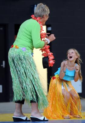 Marily Perry, of Dunedin, and her grand daughter Blaise Perry (7), of Auckland, dance during the...