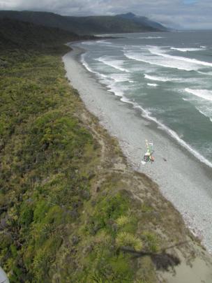 Greenstone Helicopters on South Westland beach between Gorge River and Barn Bay.