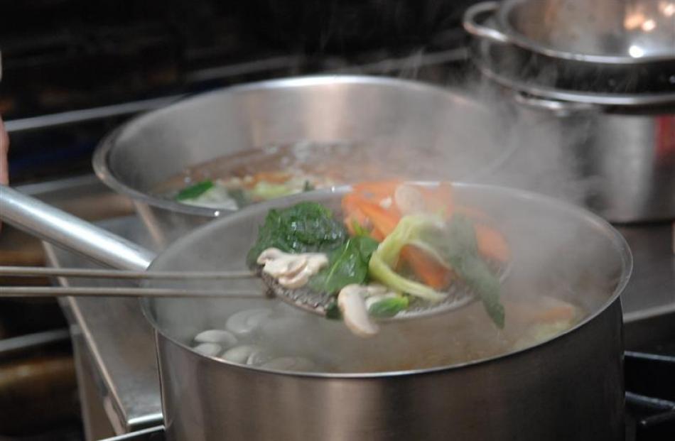 4. Slip the carrots into boiling water, and when it returns to the boil, add the mushrooms and...