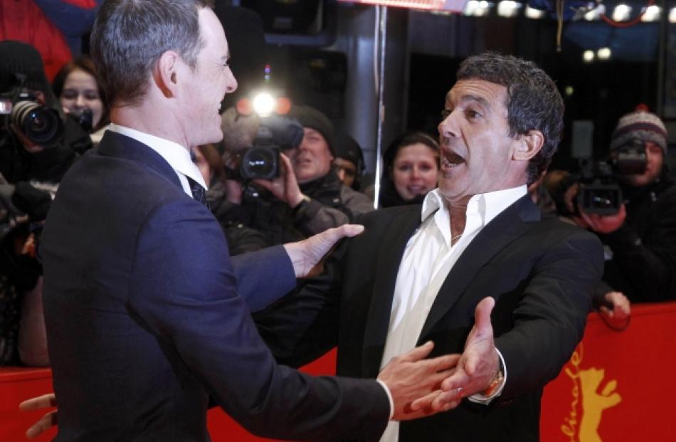 Cast members Antonio Banderas (R) and Michael Fassbender arrive for the screening of their movie ...