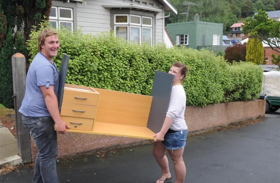 Jack Gibson (19), left) helps move primary teaching 
...