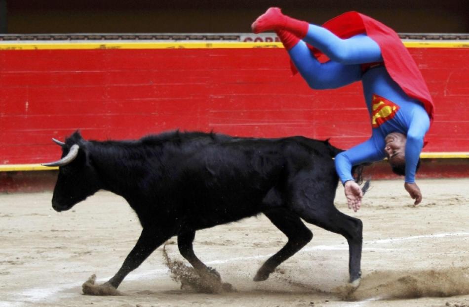 Pedro Sanchez, a dwarf bullfighter dressed in a 'Superman' costume, from the Superlandia group...