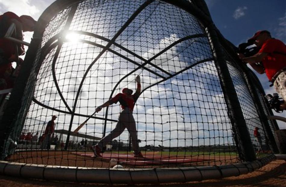 St. Louis Cardinals' Skip Schumaker takes batting practice during spring training baseball in...