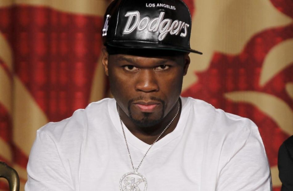 Recording artist 50 Cent attends a media conference at Grauman's Chinese Theater in Hollywood to...