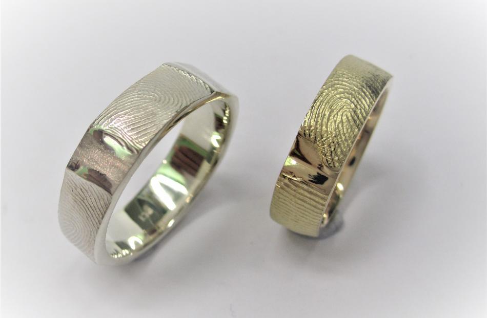 Fingerprint rings from Dunedin Goldsmiths.