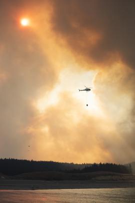 Helicopters fight the fire near Twizel. Photo: Murray Eskdale