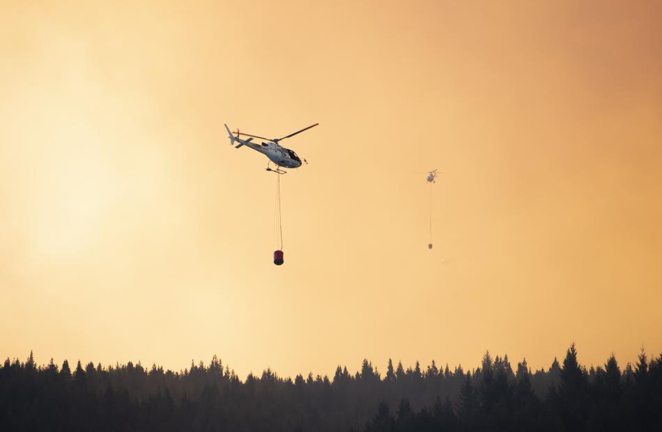 Helicopters fight the fire near Twizel. Photo: Murray Eskdale