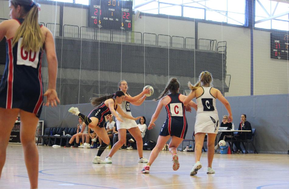 Columba College goal defence Kate Goodeve looks for options while Southland Girls’ High School...