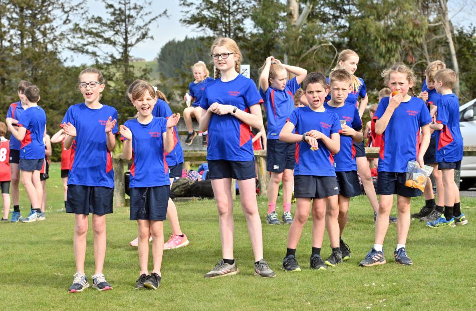 Pupils from Abbotsford School cheer on their team-mates.