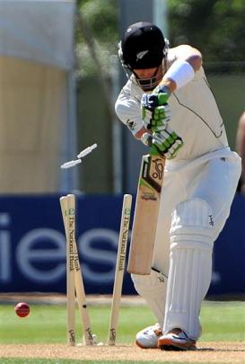 Black Caps opener Martin Guptill is bowled by Morne Morkel. Photo by Peter McIntosh.