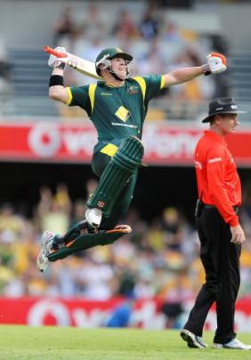 Australia's David Warner celebrates a century against Sri Lanka during their one-day...