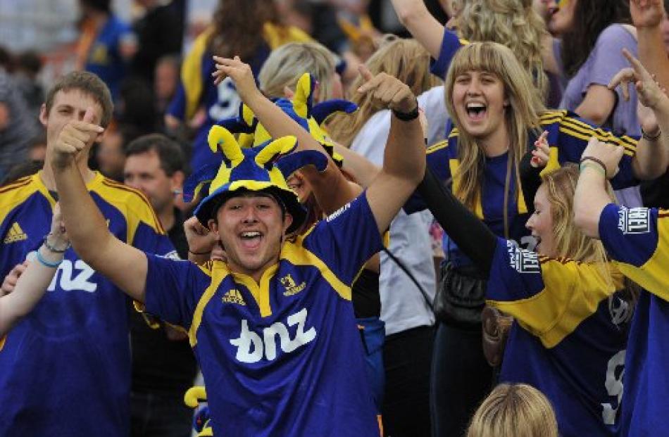 We're loving it - Highlanders fans cheer their team on. Photo Gerard O'Brien