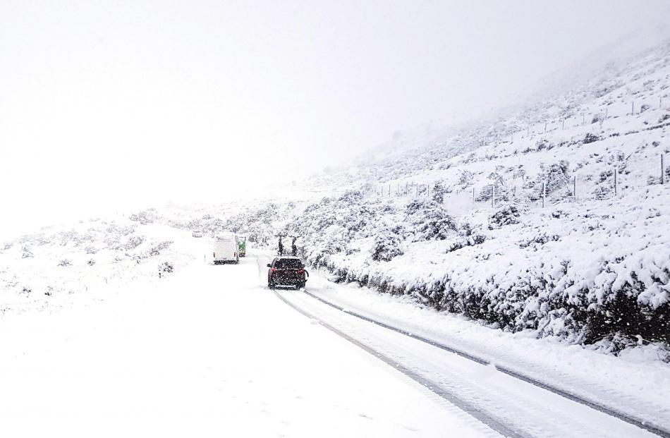 Vehicles were pulled to safety after getting stuck on SH94.  Photo: NZTA 