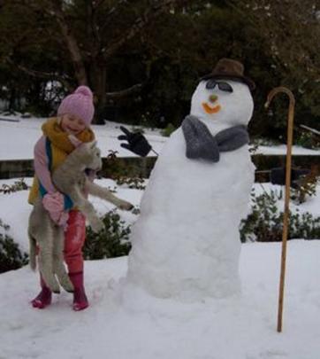 Caption: It was a special trip and first time in the snow for Chloe, who visited grandparents Deb...