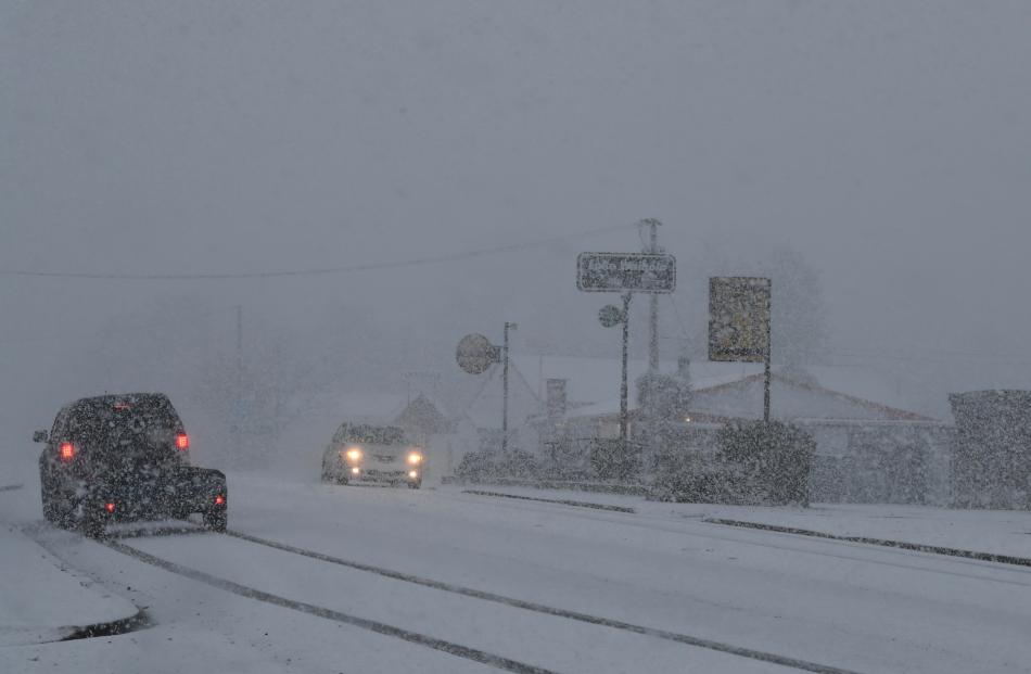 Snow made driving conditions difficult in Waihola this morning. Photo: Stephen Jaquiery