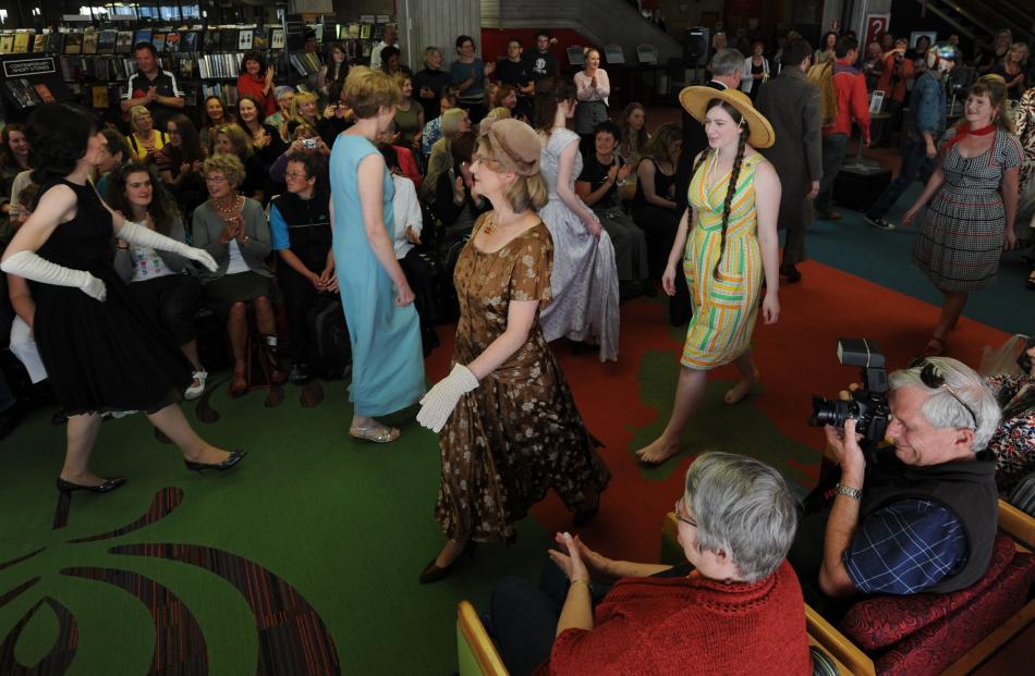 Models and library staff walk the grand finale at the show, part of the iD Fashion Week.