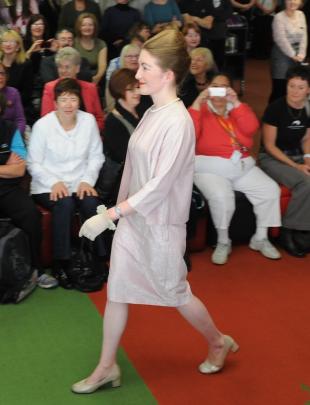 Models and library staff walk the grand finale at the show, part of the iD Fashion Week.