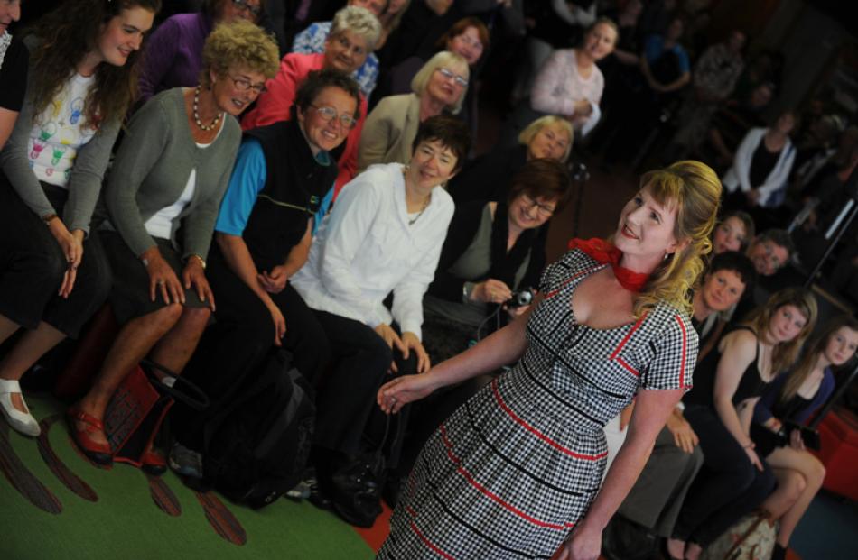 Dunedin Central Library staff member Emma Milburn models a vintage dress during the geek/chic...