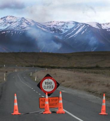 Lake Ohau Rd was closed to all but a steady stream of emergency service vehicles yesterday. 