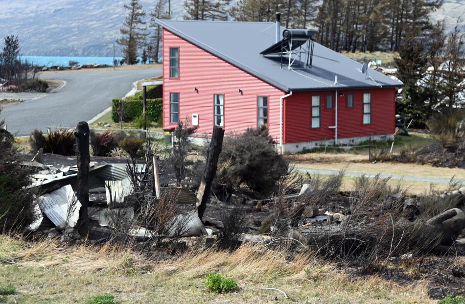 A house still stands in the centre of Ohau Village while more than 40 others were destroyed.
