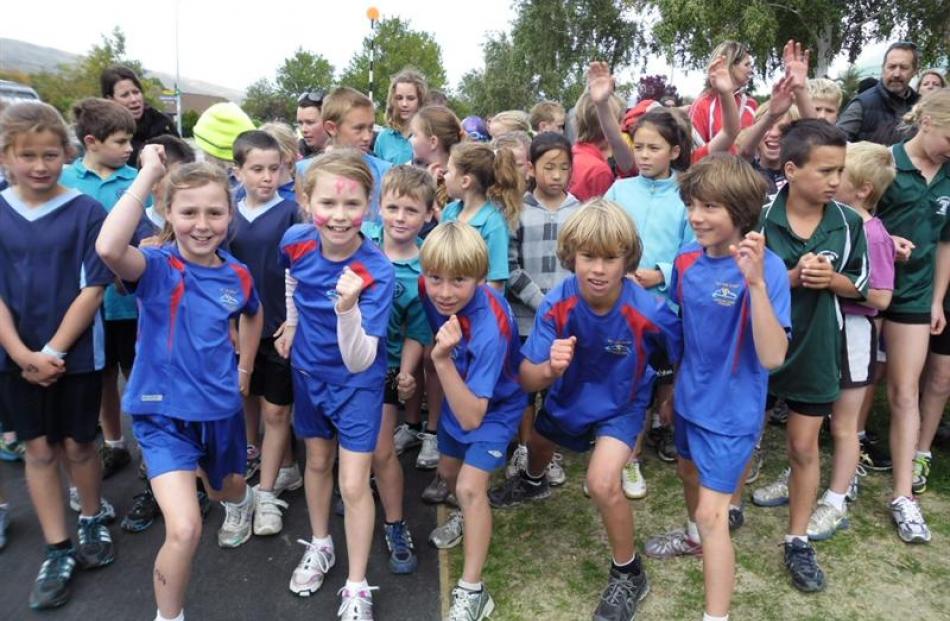 Arrowtown School blue shirts (from left) Jemima Stevens, Isla Gourlay, Fynn Williams, Nathan Hill...