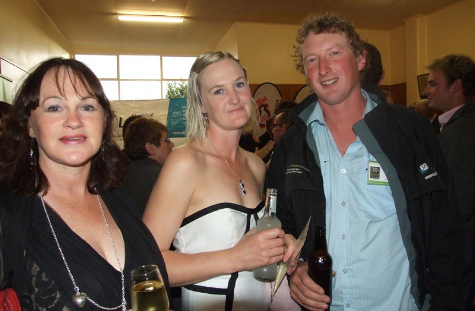 Joanne Marsh, of Kaitangata, Sharni Marsh, and Shane Bichan, both of Pounawea.