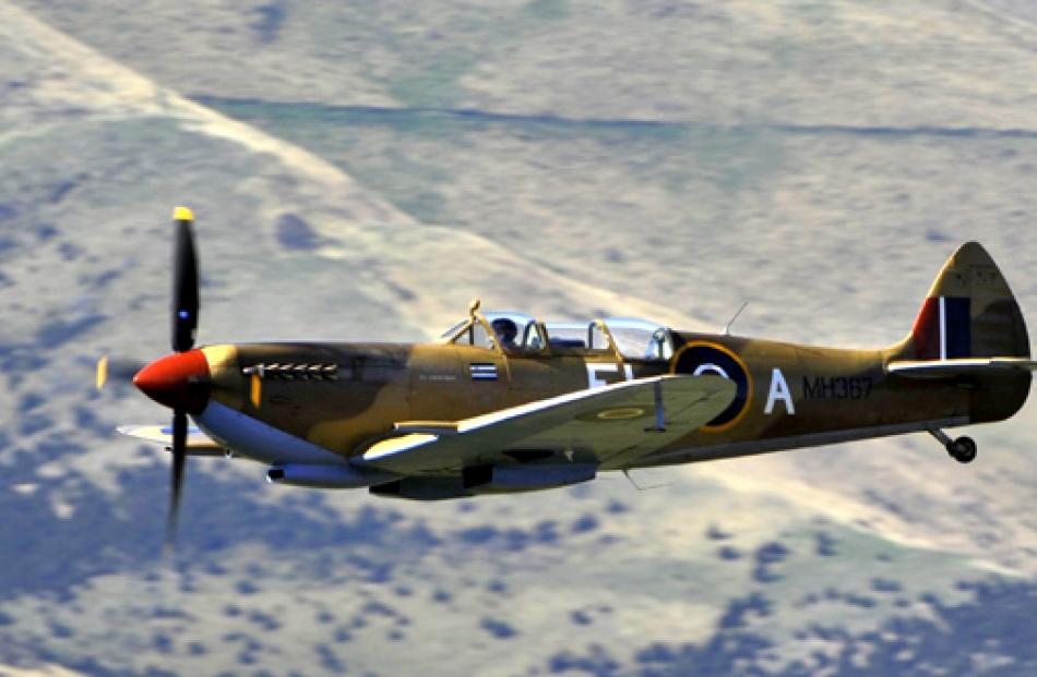 A Spitfire performs a low pass during Warbirds over Wanaka on Saturday afternoon.