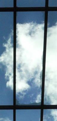 The jagged remains of the double-glazed  heat-toughened glass ceiling panel that shattered. Photo...