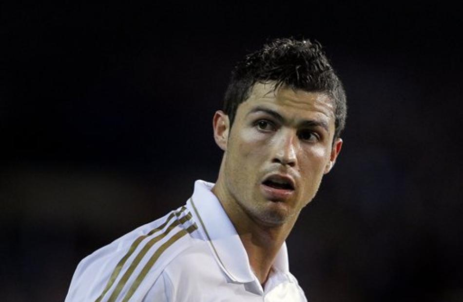 Real Madrid's Cristiano Ronaldo reacts during a Spanish La Liga match against Atletico de Madrid...