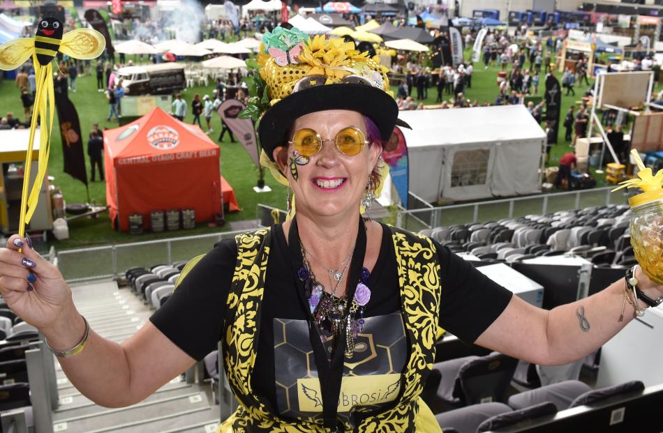 Vicki ‘‘Purple’’ Yarker-Jones promotes honey mead and the cause of bees at the Dunedin Craft Beer...