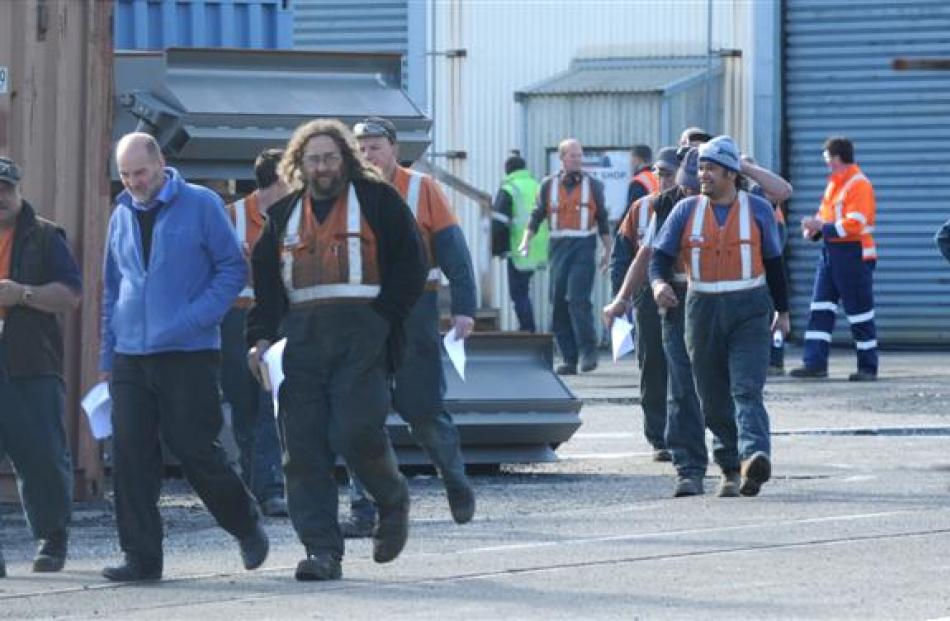 Hillside workshops staff leave the meeting following the announcement.