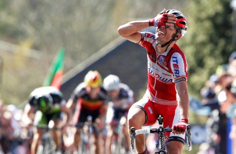 Katusha team rider Joaquim Rodriguez of Spain celebrates as he wins the Fleche Wallonne Classic...