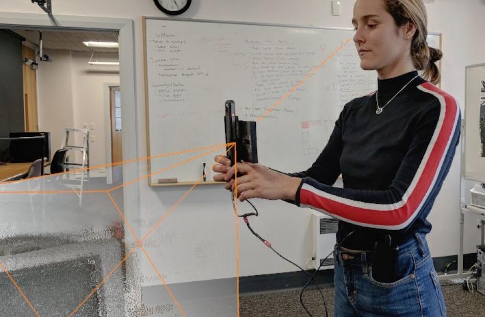 University of Otago research assistant Rosa Lutz tests the prototype. 