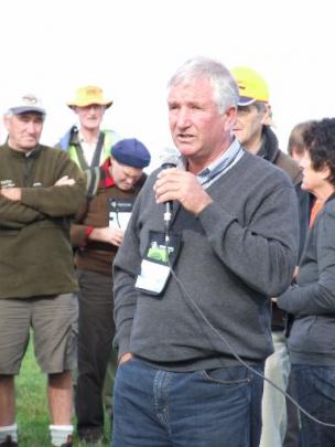 Robert Reid, of Verterburn, addresses the crowd attending a field trip to the property during the...