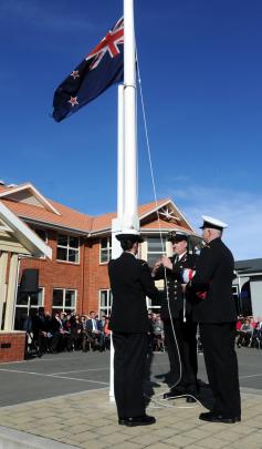 Lowering the flag at Montecillo War Veterans Home.