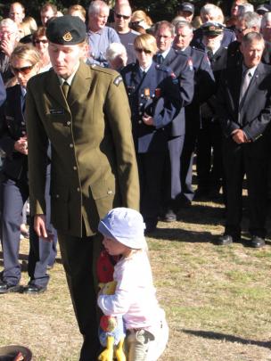 Selma Roberts and daughter Caitlin (2), both of Arrowtown, take part in services at the Arrowtown...