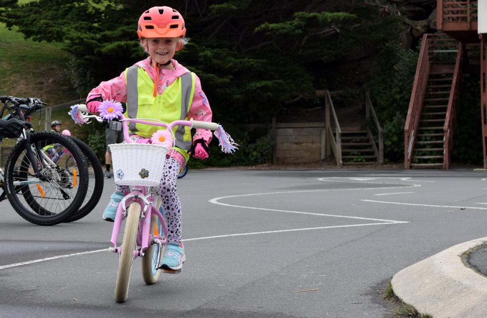 Camille Mirosa (6), of Woodhaugh, rides her bike in St Kilda on Sunday.

