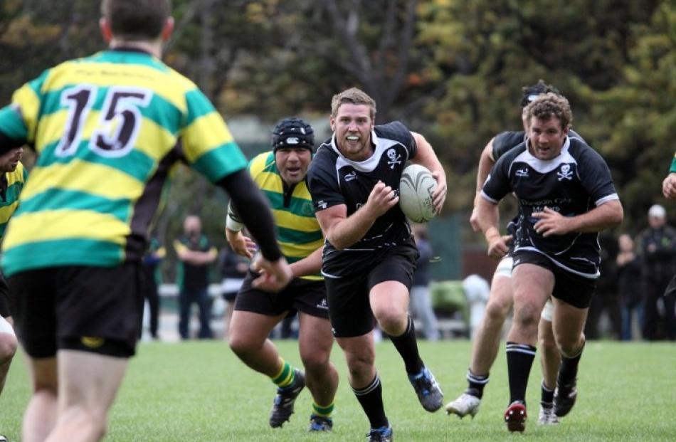 The fullback's view as Pirates lock Travis McIntosh steams through a gap with Garth Swan in support.