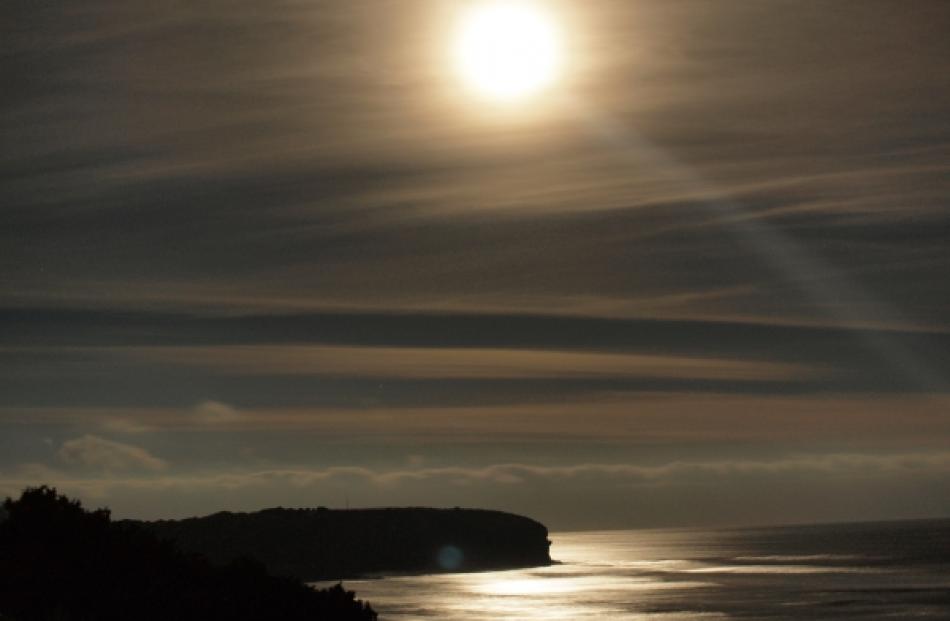 The moon, viewed over John Wilson Drive last night. Photo by Darryn Greer .