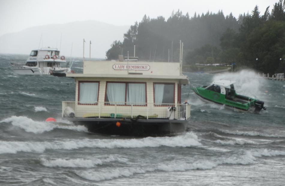 Catamaran Lady Pembroke was driven ashore from its mooring during high winds in Wanaka yesterday....