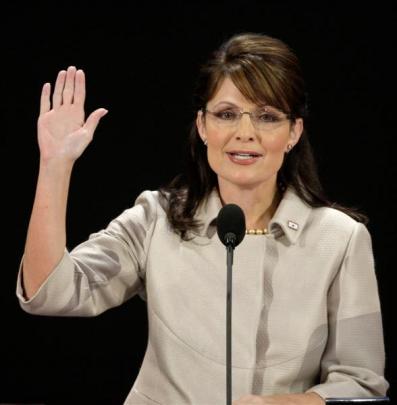 Palin gestures during her speech. Photo Ron Edmonds/AP.