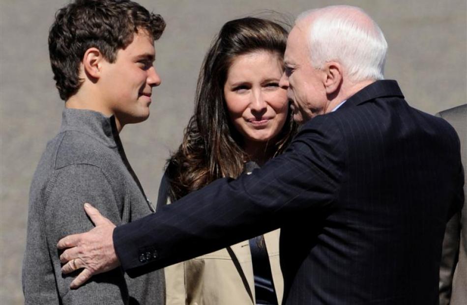 Sen. John McCain greets Bristol Palin and her boyfriend, Levi Johnston on Wednesday. Photo Susan...